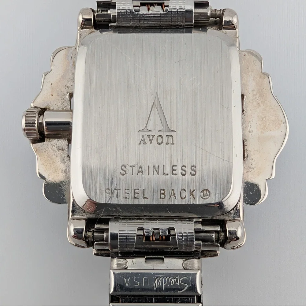 Avon silver tone